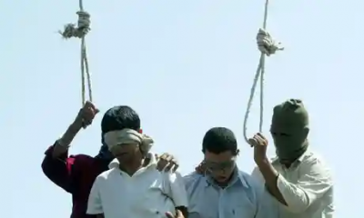 Two teenagers are publicly hanged under anti-gay laws in Mashhad, Iran.